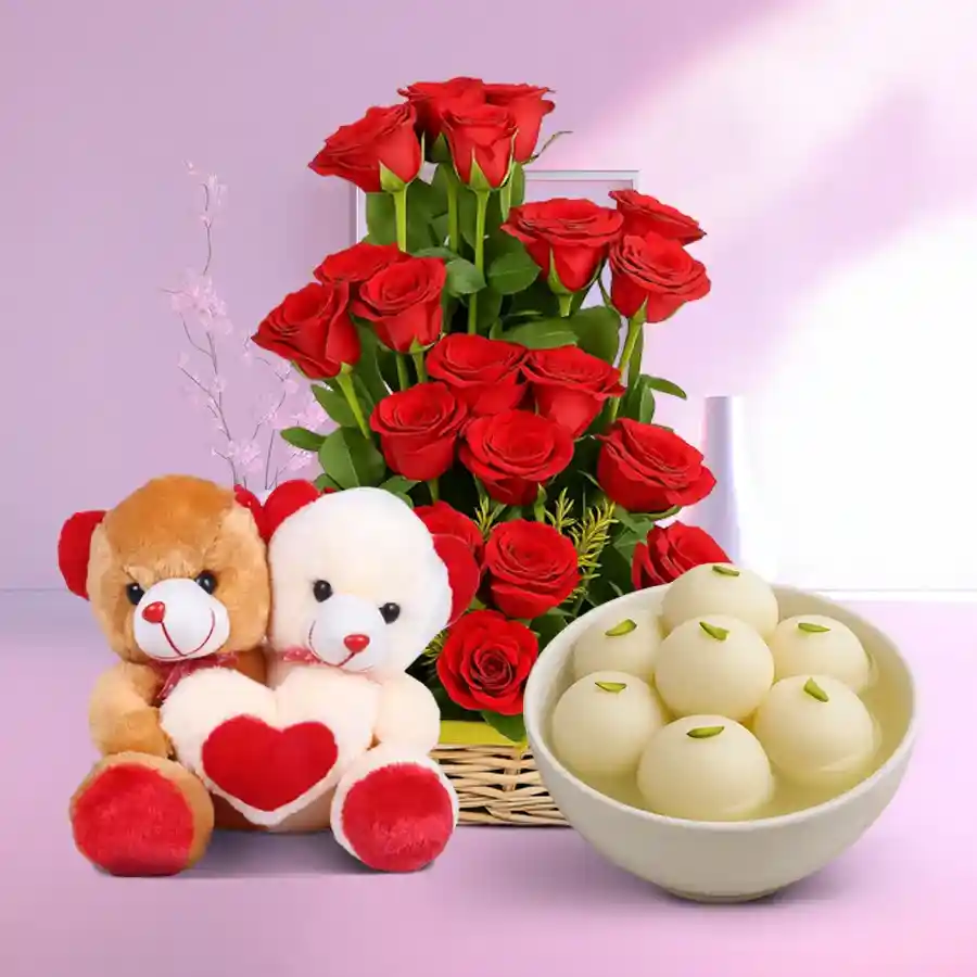 Gift combo featuring 15 red roses, twin teddy bears, and canned Rosogolla.