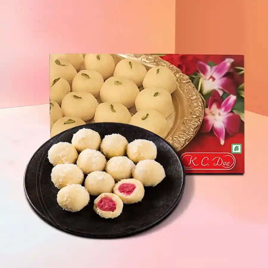 Box containing 10 pieces of Khir Kadam, a traditional Bengali sweet with a creamy center and khoya layer.