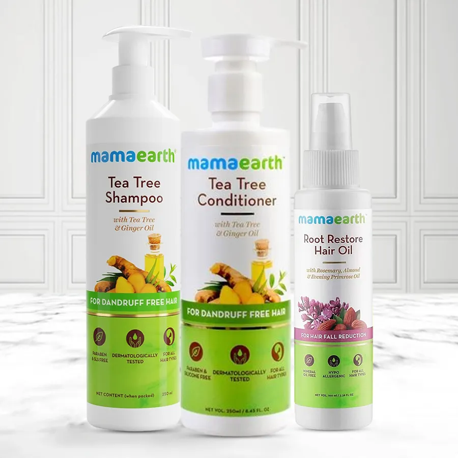 Nurturing Mama Earth Hair Care Set featuring shampoo, conditioner, and hair oil for healthy, beautiful hair.