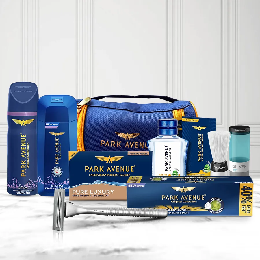Ultimate Men's Grooming Essentials kit from Park Avenue featuring body spray, soap, shaving cream, and more in a travel pouch.