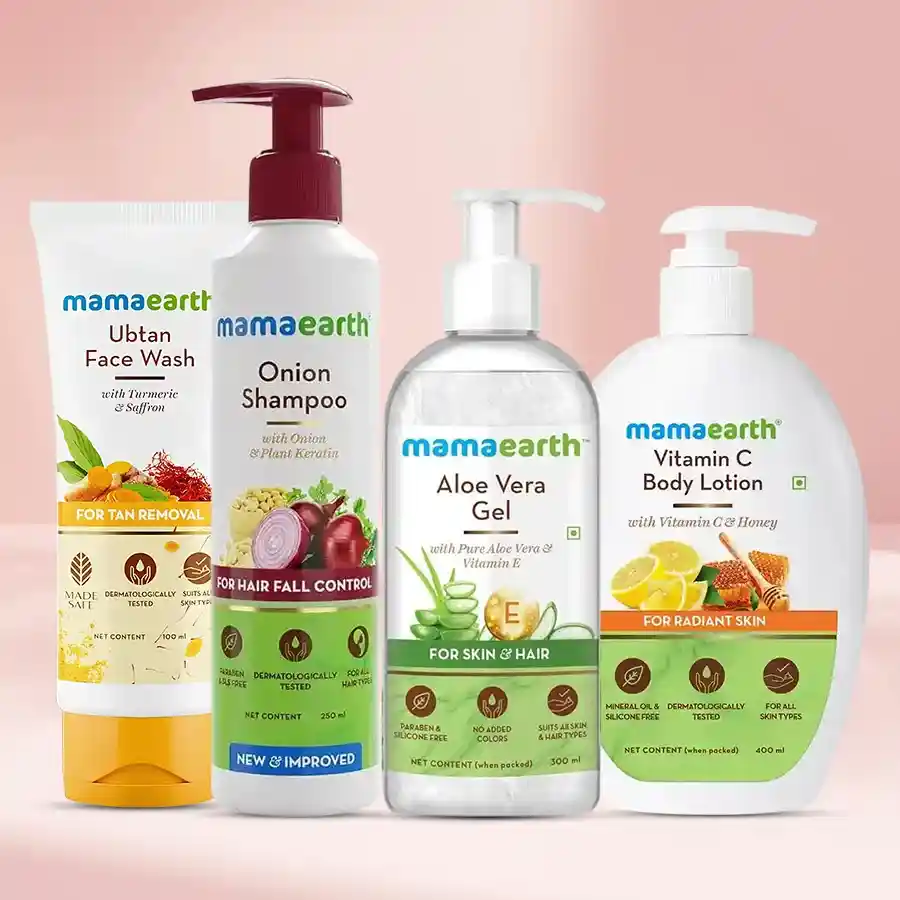 Mamaearth Body Care Gift Set with aloe vera gel, ubtan face wash, onion shampoo, and body lotion for skin and hair nourishment.