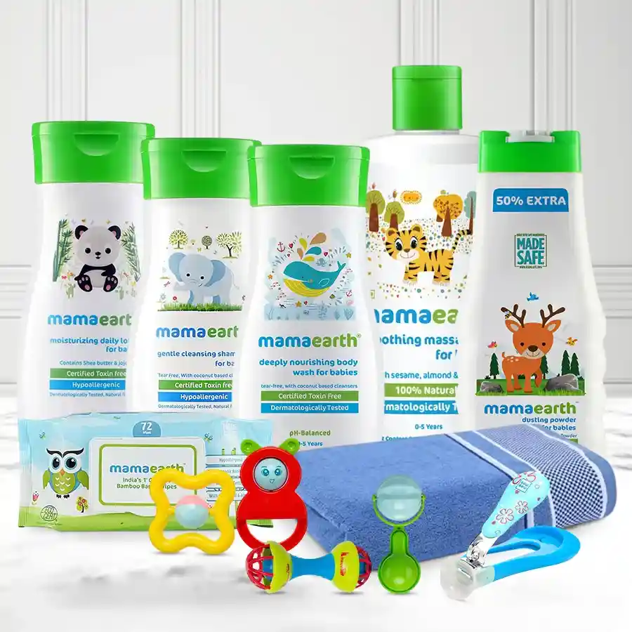 Baby Bliss Care Package featuring Mamaearth newborn care essentials, including massage oil, body wash, lotion, wipes, rattle set, and more.