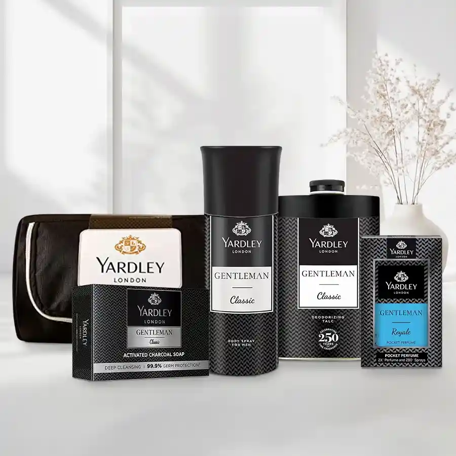 Luxurious Yardley Grooming Gift Set featuring perfume, deodorant, talcum powder, charcoal soap, and a stylish pouch. Perfect for gifting.