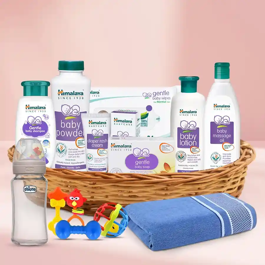 Himalaya Baby Care Gift Set, including shampoo, lotion, rattle, towel, and more, beautifully arranged for gifting.