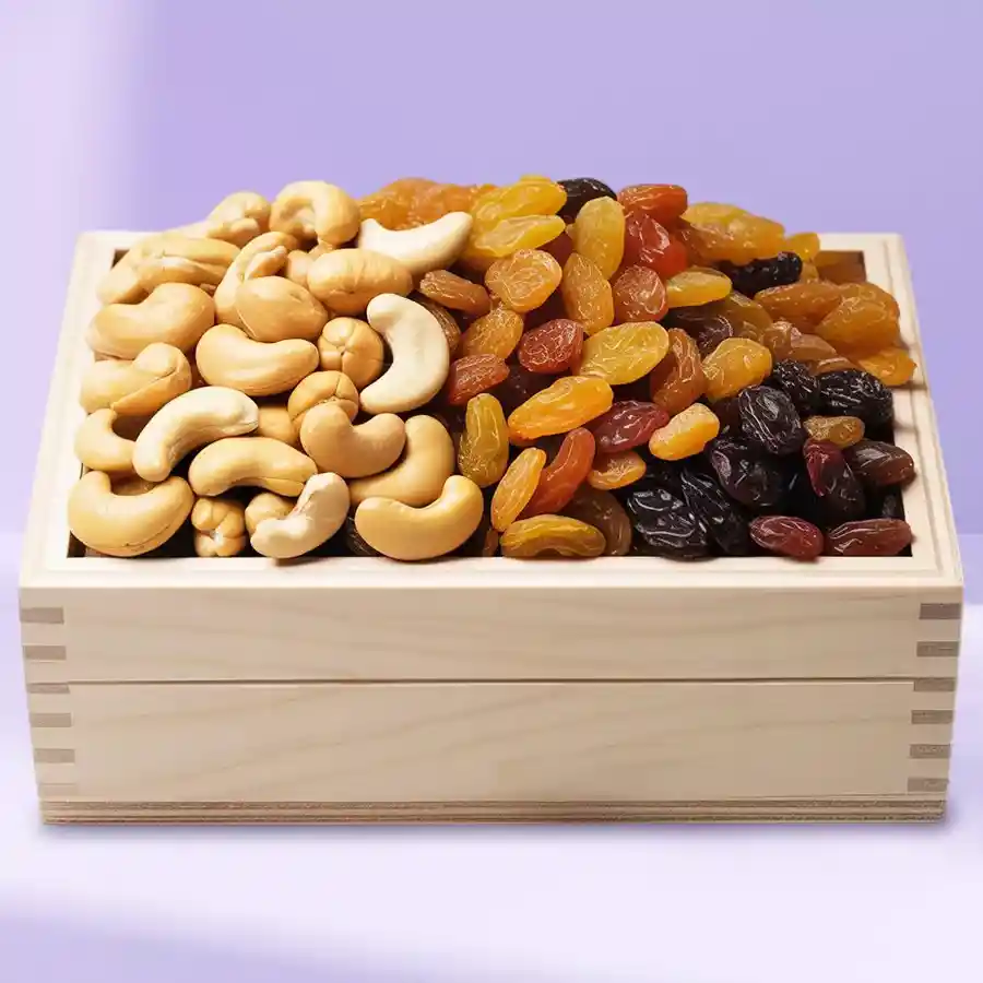 Delightful Cashew and Raisin Gift Box featuring a wooden container filled with fresh cashews and raisins. Perfect for gifting.