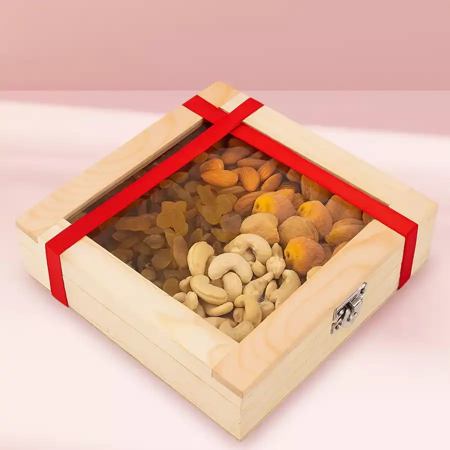 Gourmet Wooden Gift Box containing assorted dry fruits: cashews, raisins, almonds, and apricots, beautifully presented for gifting.