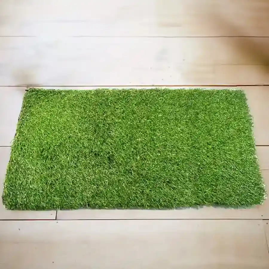 Lush green rectangular artificial polyester grass doormat, 40x60 cm, featuring an antiskid design for safety and style.