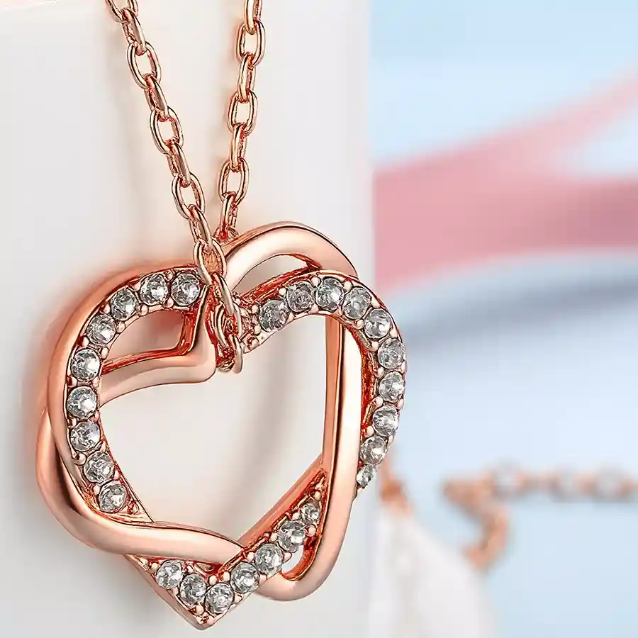 Elegant Hearts in Love Crystal Pendant Necklace with 18K rose gold plating and Austrian crystals.