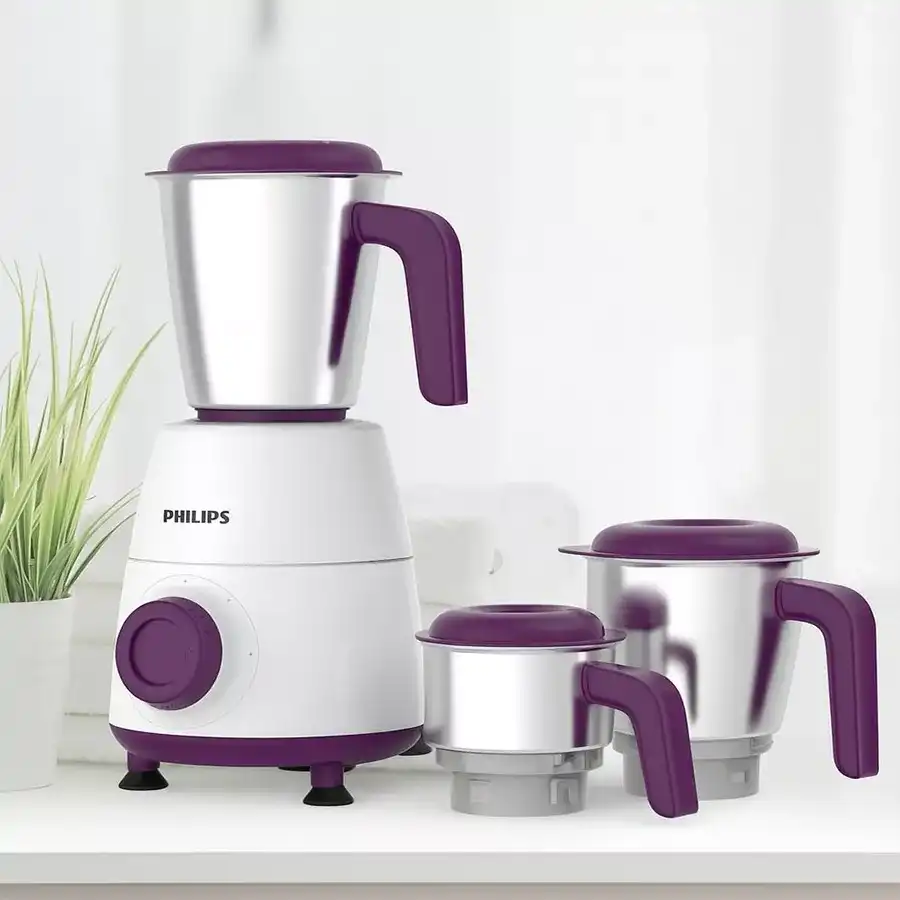 Philips Daily Collection Mixer Grinder in white with three jars, showcasing its stylish design and powerful performance for efficient kitchen tasks.