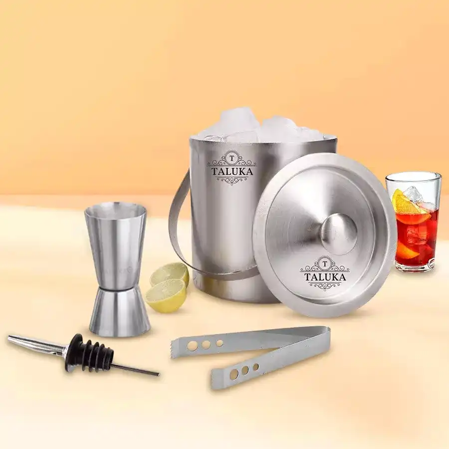 Stylish Stainless Steel Bar Accessories Set including ice bucket, tongs, measure, and pourer for an elegant home bar experience.