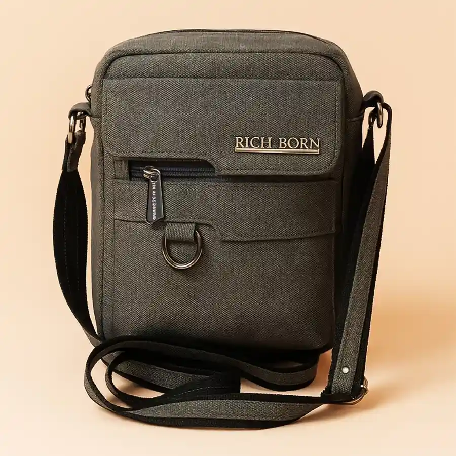 Sturdy Gents Sling Bag in Marvel Grey, featuring a front pocket and made from foam leather in a stylish jeans finish.