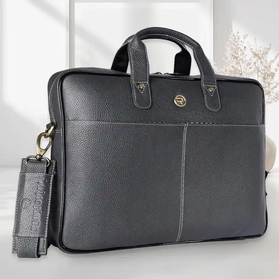 Stylish mens leather laptop bag in graphite grey, fits laptops up to 16 inches.