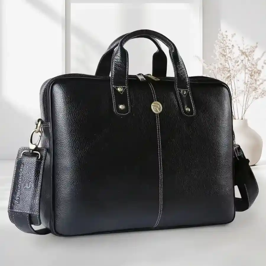 Stylish leather laptop bag for men in brown, designed to fit 14-16 inch laptops, featuring multiple compartments for organized storage.