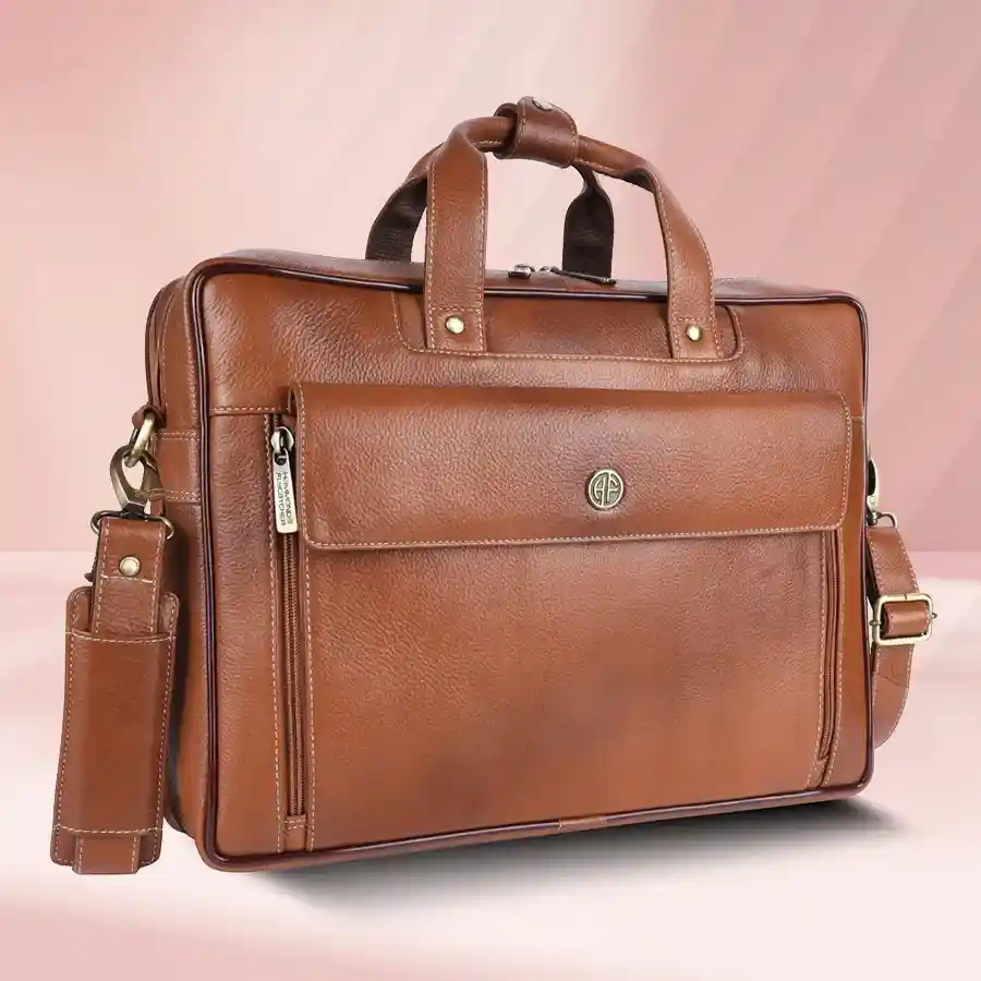 Stylish Expandable Leather Laptop Bag for men in tan, fitting laptops up to 16 inches, featuring an adjustable strap and durable genuine leather.