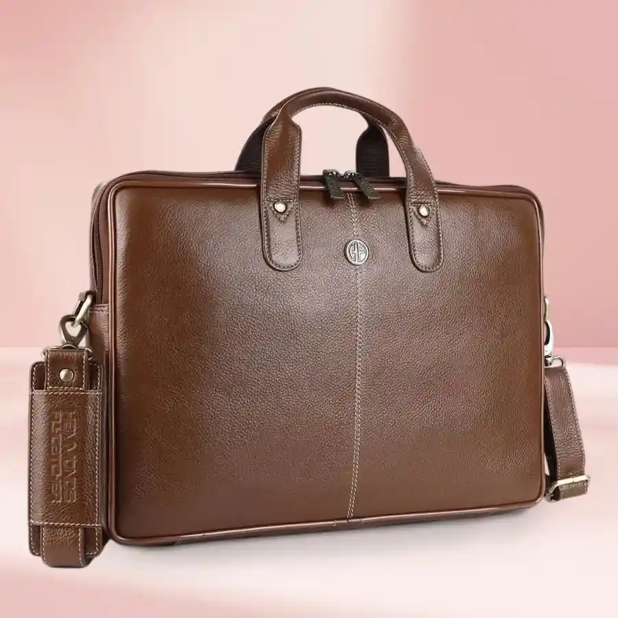 Modern leather laptop bag for men in Brushwood, fits 14-inch laptops, with compartments for organization and an adjustable shoulder strap.