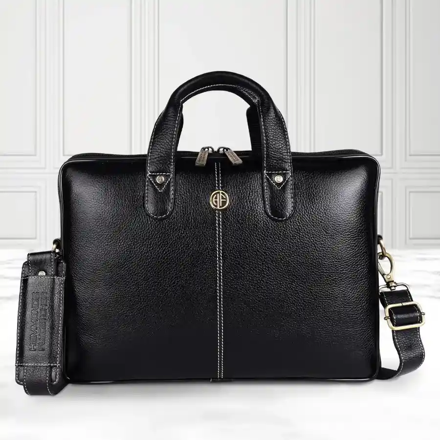 Stylish black laptop bag designed for men, fits up to 14-inch laptops, ideal for professional use with a sleek and organized design.