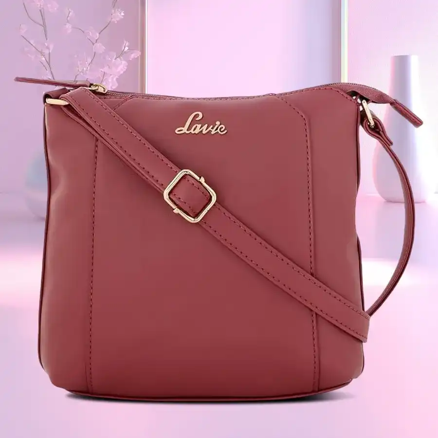 Lavie Cetan Ladies Suave Crossbody Sling Strap Bag in tan faux leather with multiple pockets and compartments.