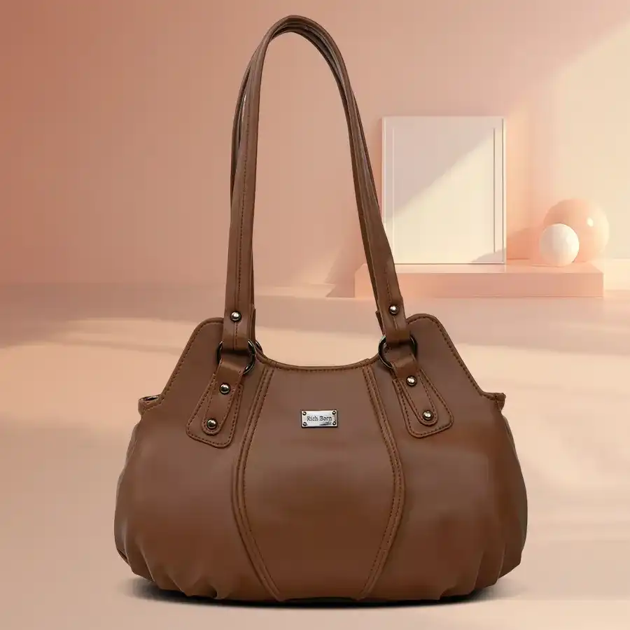 Trendy Twin Chamber Ladies Shoulder Bag in coffee color by Richborn, featuring faux leather material and stylish side zips.