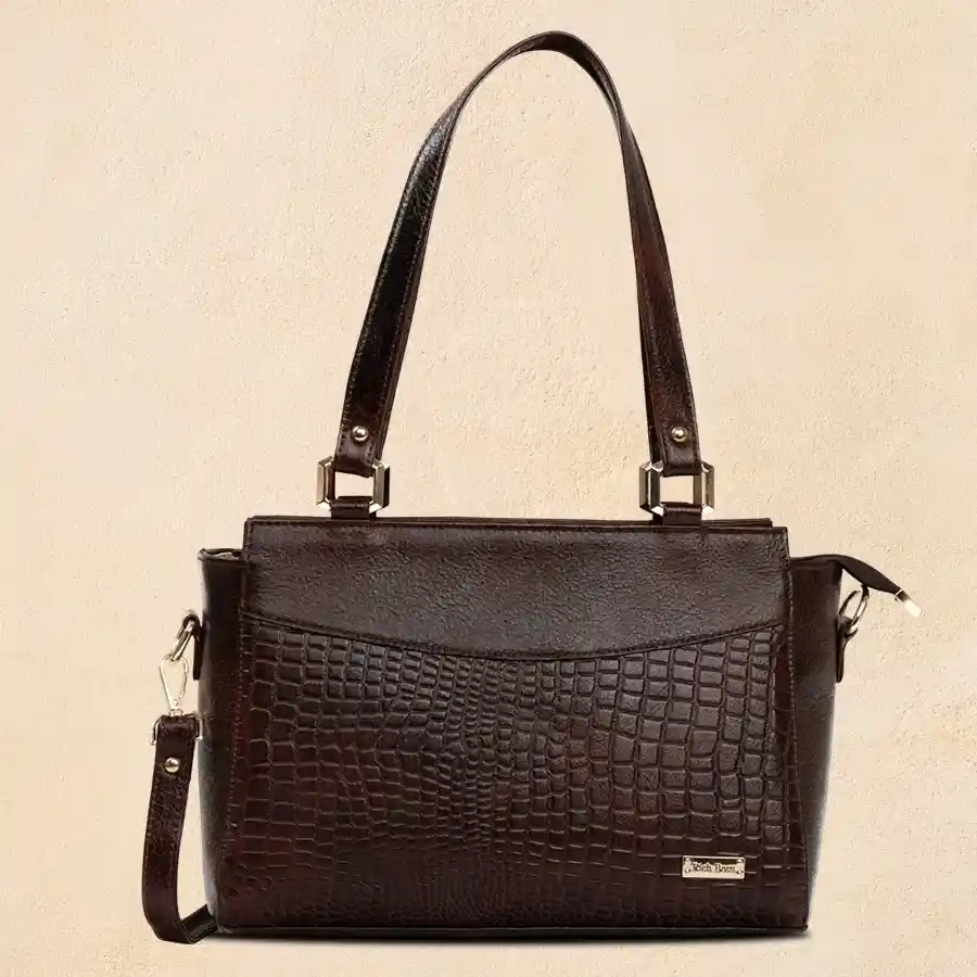 Stylish dark brown ladies office bag made of faux leather with two chambers, perfect for everyday use.