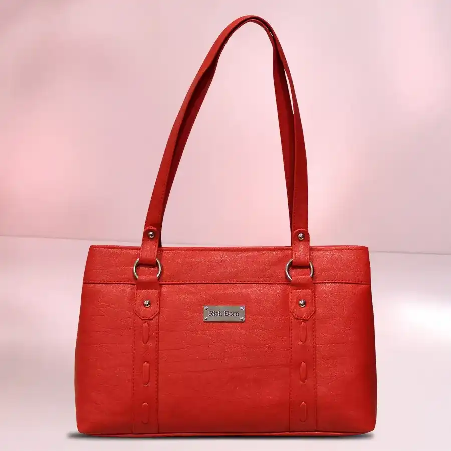 Radiant Red Shoulder Vanity Delight bag, featuring two chambers and a front zip, crafted from faux leather.