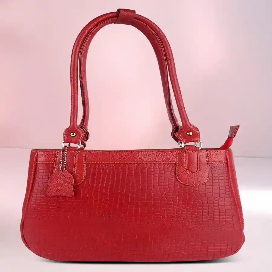 Light pink faux leather ladies vanity bag featuring a front zip, perfect for stylish gifting or personal use.