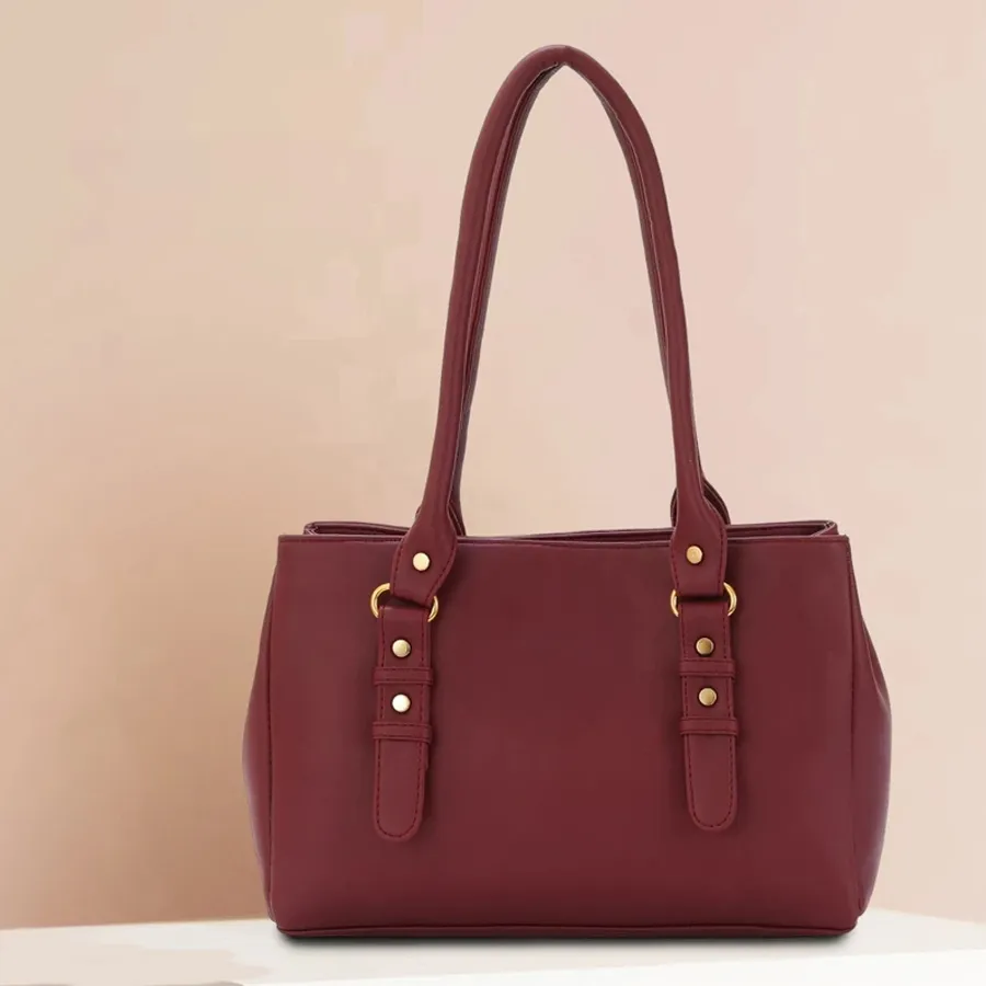 Maroon faux leather shoulder bag designed for stylish daily use.