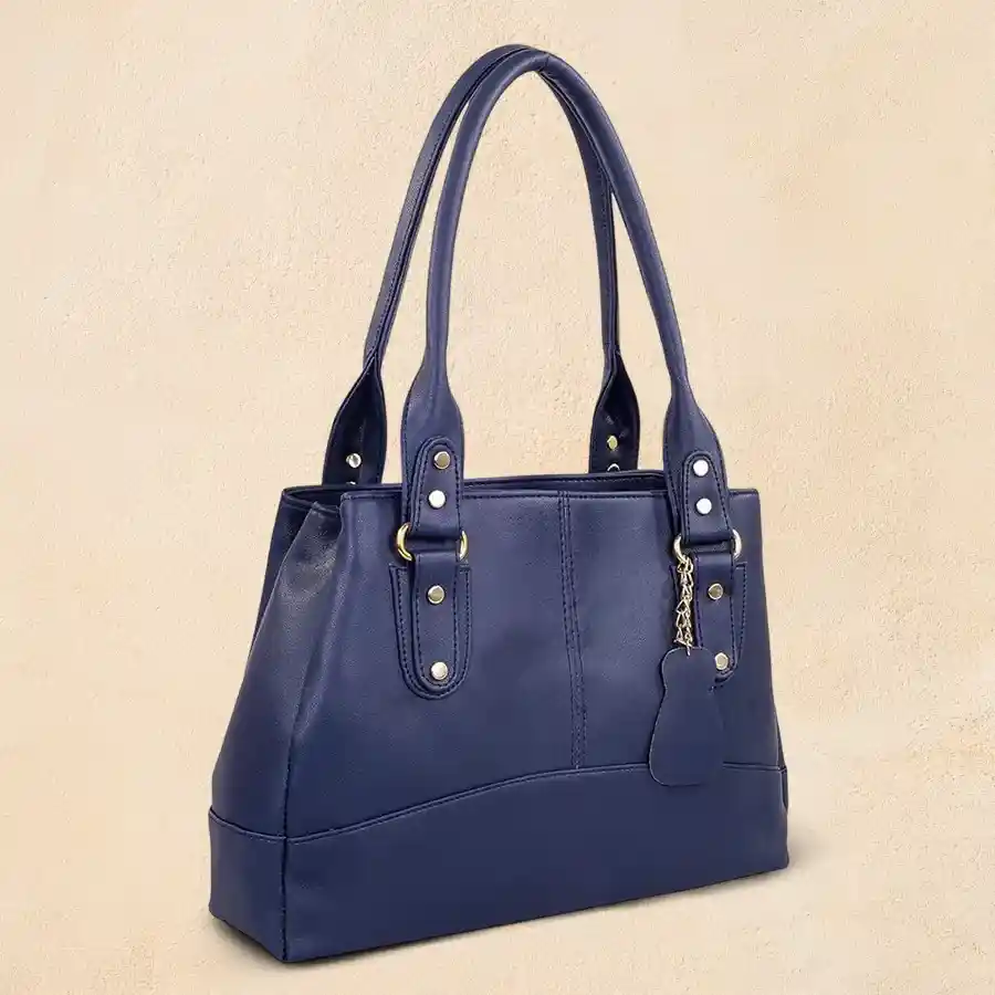 Striking blue faux leather shoulder bag with bottom belt design for women.