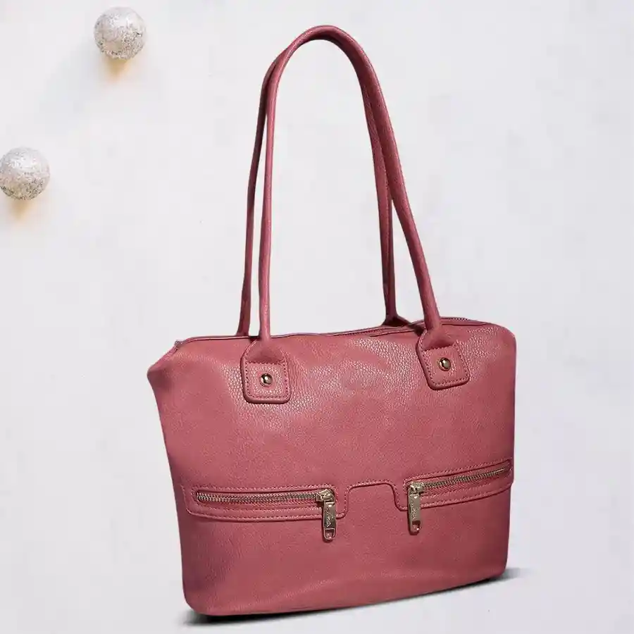 Chic dark peach ladies vanity bag with front zip, crafted from faux leather. Perfect for stylish organization and gifting.