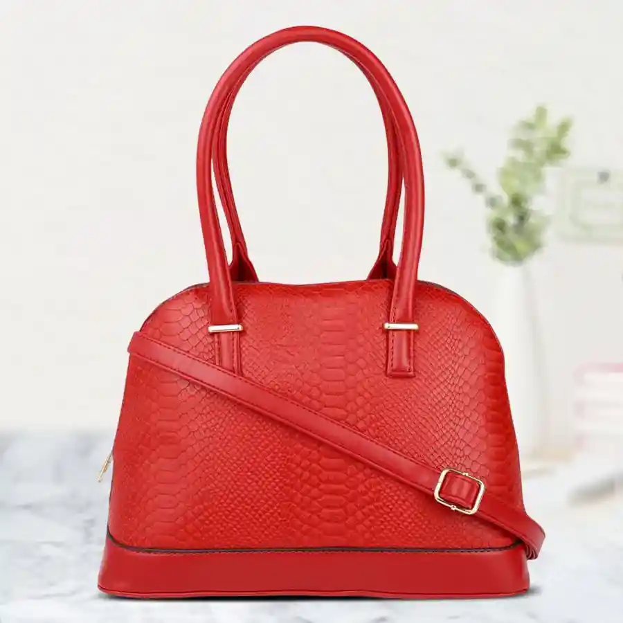 Chic Red Faux Leather Vanity Bag with embossed pattern, featuring two compartments for organization and style.
