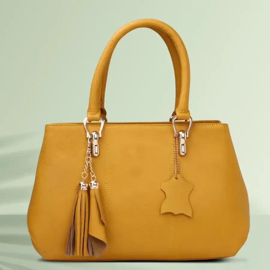Vibrant yellow shoulder bag with embroidery, made from faux leather, ideal for ladies' daily use.