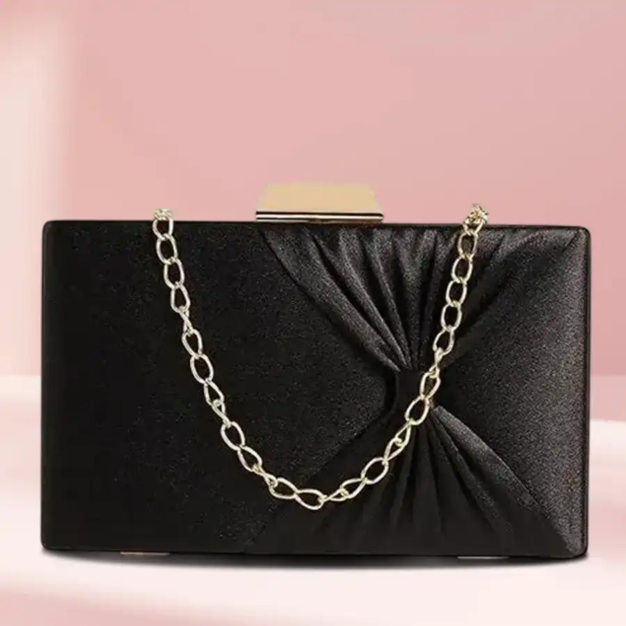 Chic Bow Frame Sling Bag in black with elegant bow detail and detachable chain strap.