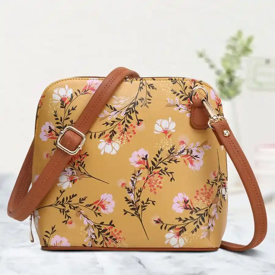 Suave Trapeze Crossbody Sling Bag in Mustard Flower Multi-Colour, featuring a sleek trapeze silhouette and luxurious faux leather.