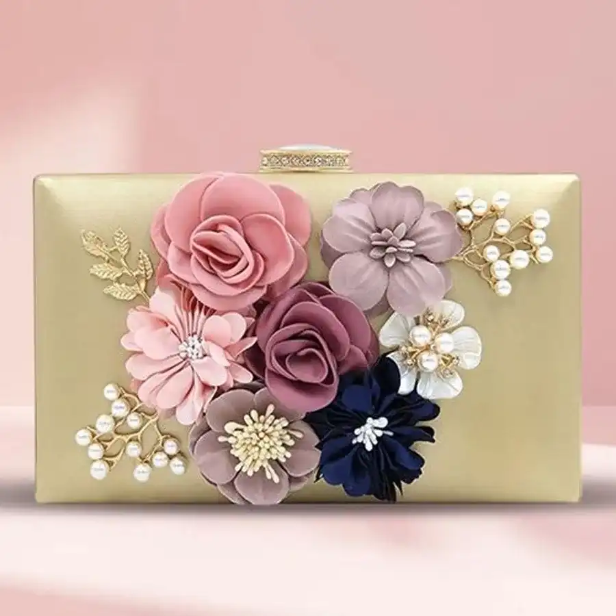 Glamorous Floral Gold Clutch, crafted from faux leather with intricate floral designs, perfect for evening parties and special occasions.