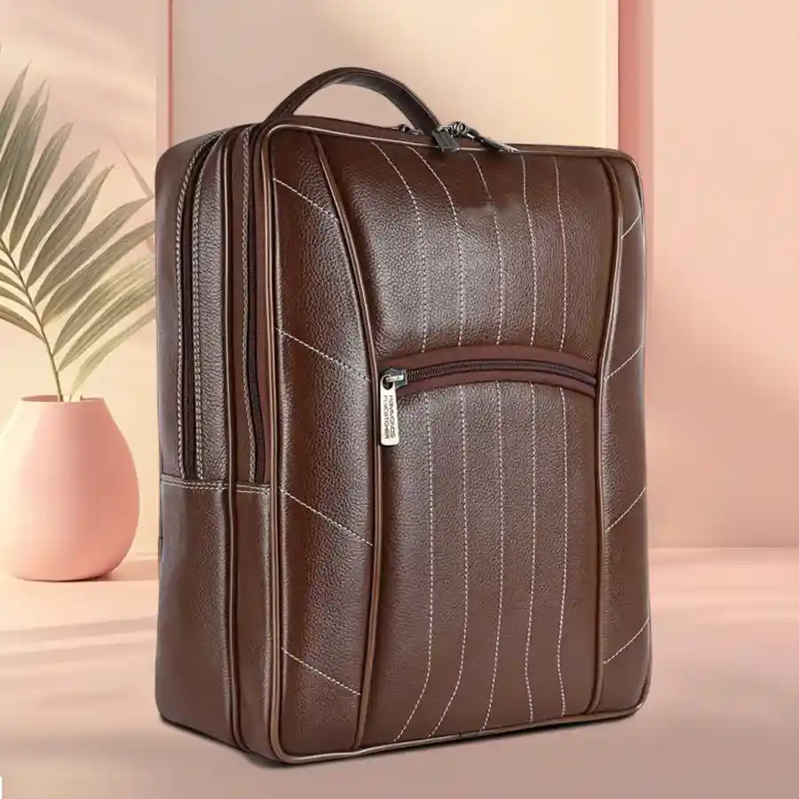 Stylish leather laptop backpack made from brushwood, fits up to 16-inch laptops, featuring adjustable straps and multiple interior pockets.