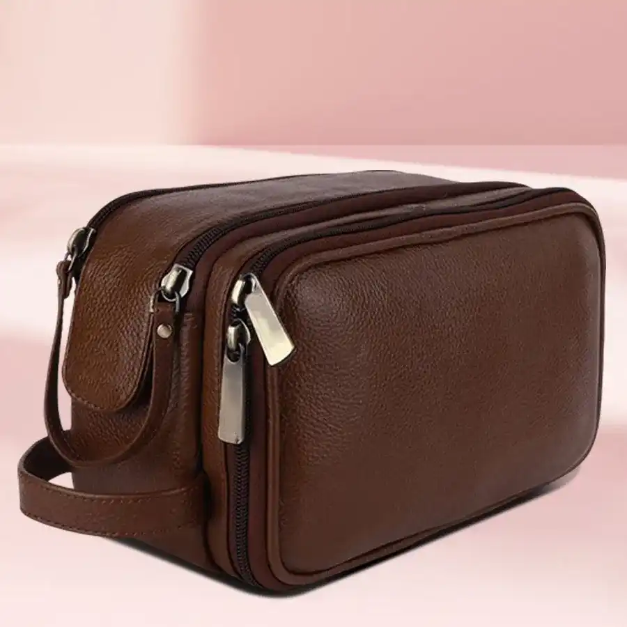 Trendy Leather Toiletry Travel Kit in Brushwood color, featuring multiple compartments for organized grooming essentials.