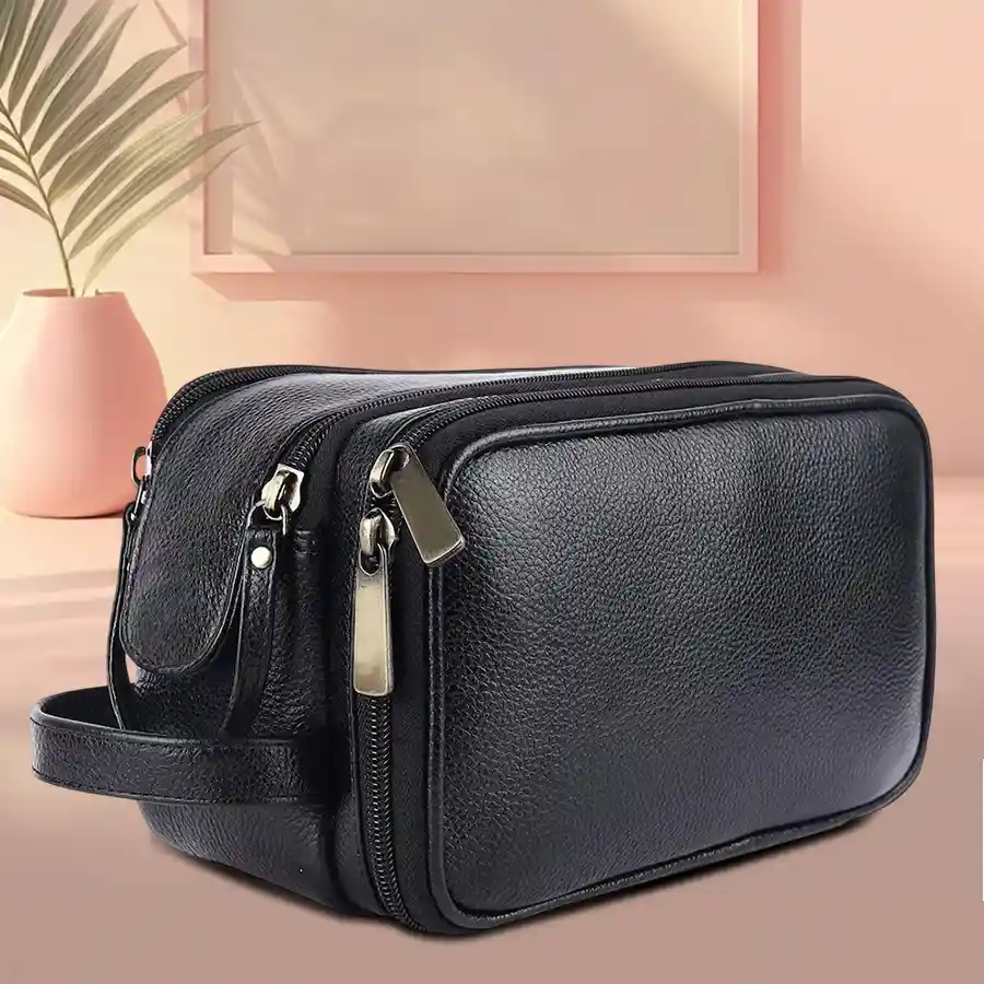 Travel-Ready Leather Toiletry Kit in black, featuring multiple compartments for organized grooming essentials.