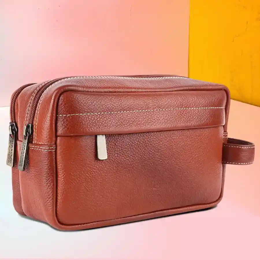 Elegant Tan Leather Toiletry Bag for men, featuring multiple compartments for organized storage of grooming essentials.
