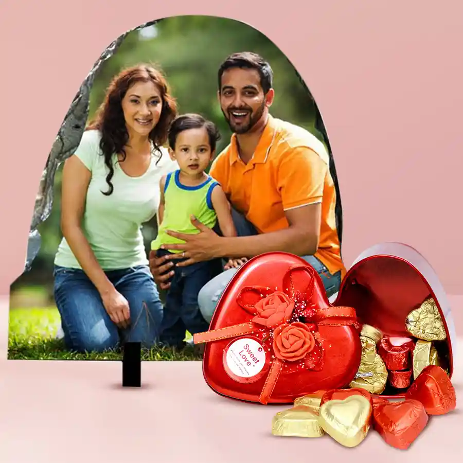 Personalized photo rock stone with heart-shaped handmade chocolates, ideal gift for love celebrations.