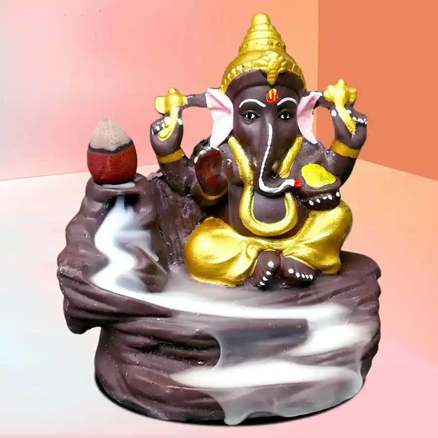Impressive Lord Ganesh Smoke Backflow Cone Incense Showpiece in multi-color resin, ideal for enhancing spiritual ambiance.