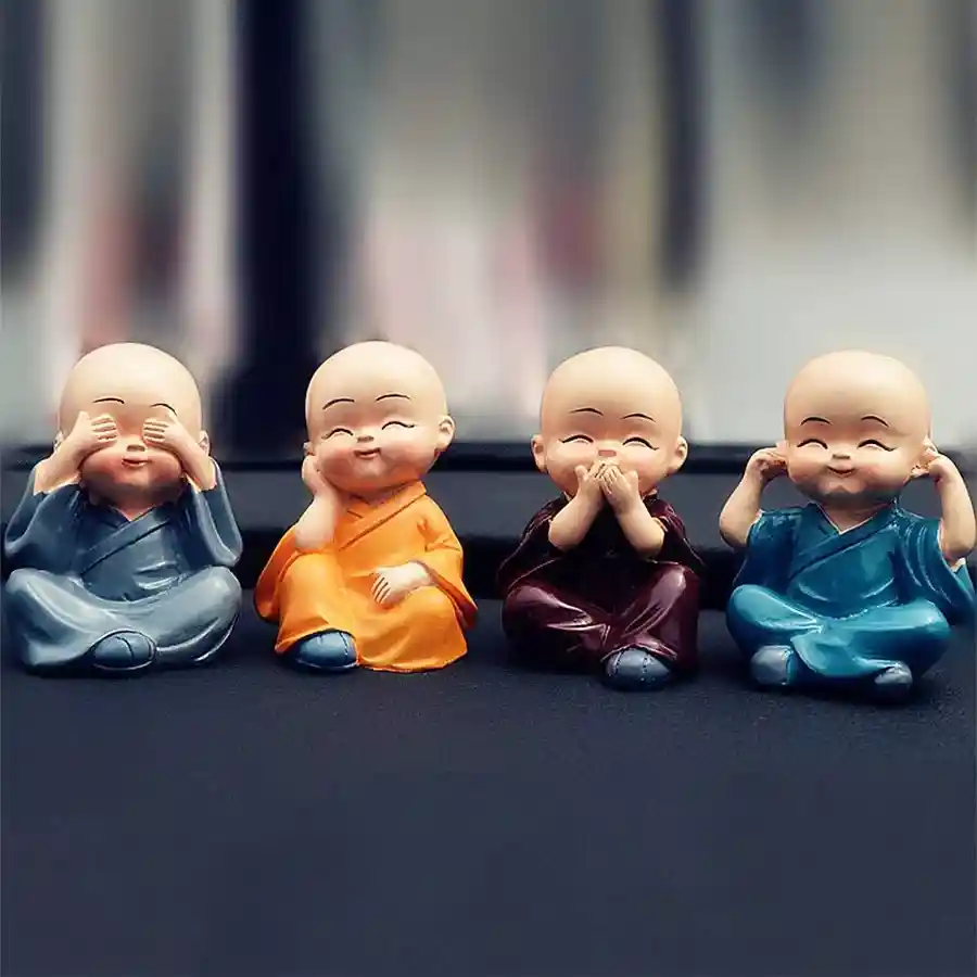 Four Monk Buddha Charm Statue in vibrant colors, symbolizing peace and harmony, measuring 2.55 x 1.77 inches.
