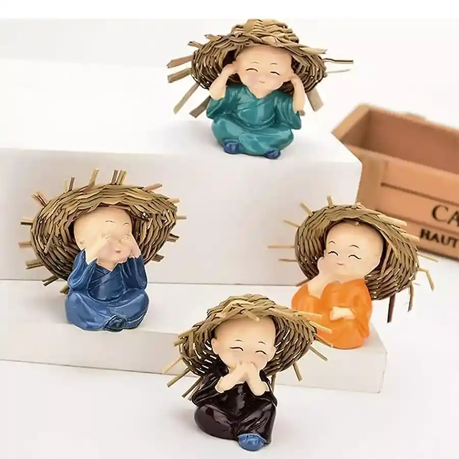 Set of four colorful Baby Hat Monk Buddha idols made from polyresin, each 10cm tall, perfect for decoration or gifting.