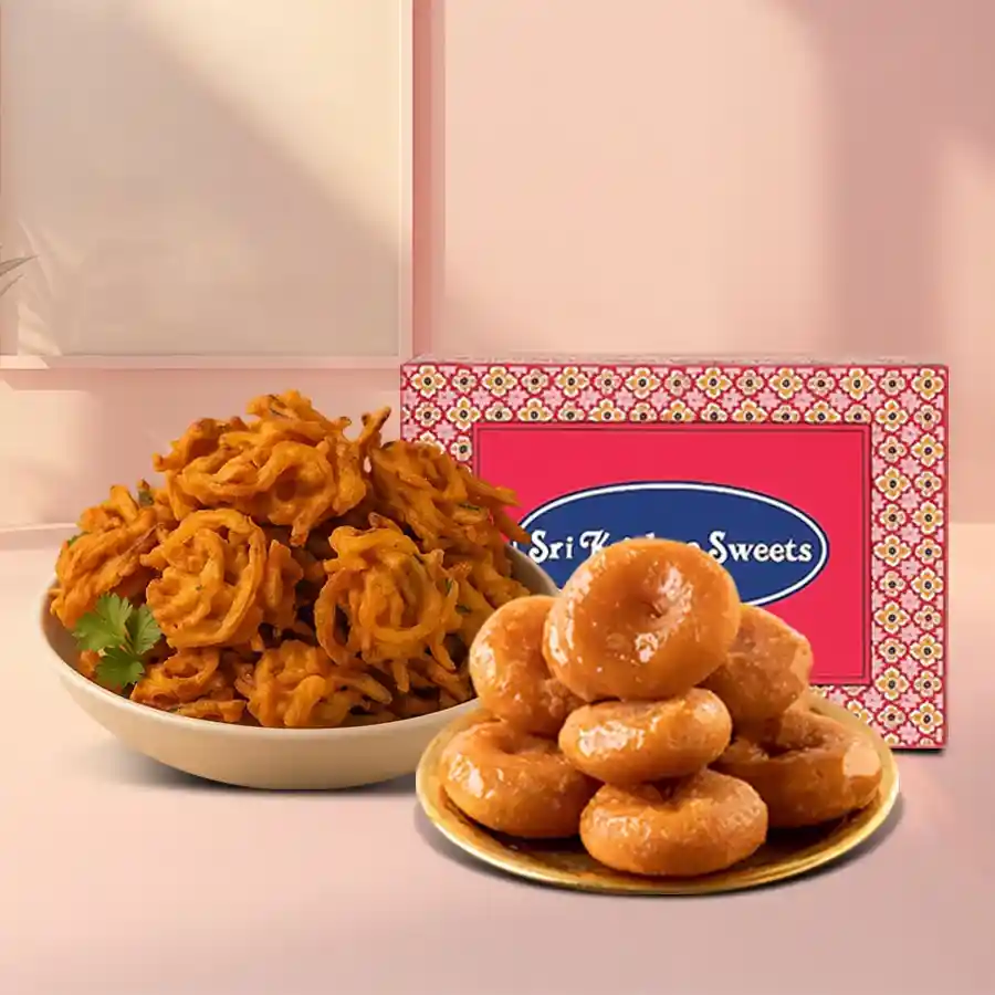 A tempting combo of crispy onion pakoras and sweet Badusha, perfect for sharing or savoring alone.