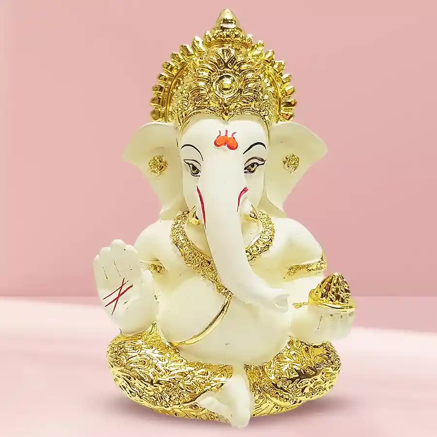 Sacred Lord Ganesha Ceramic Idol in gold and off-white, beautifully crafted to inspire love and blessings.