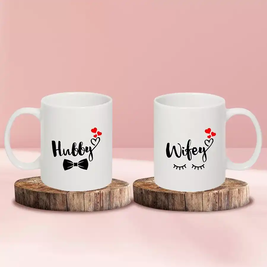 A charming pair of ceramic mugs symbolizing connection and togetherness, ideal for sharing warm beverages.