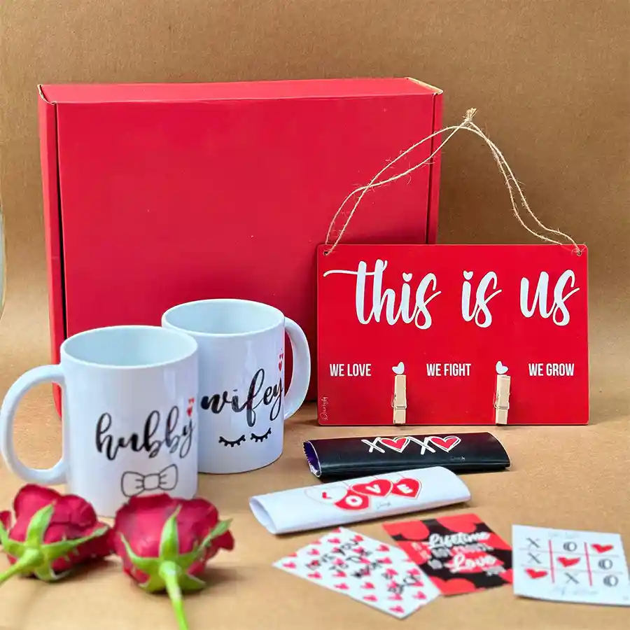 Love's Keepsake Hamper featuring ceramic mugs, chocolates, and Valentine cards for a romantic gift experience.