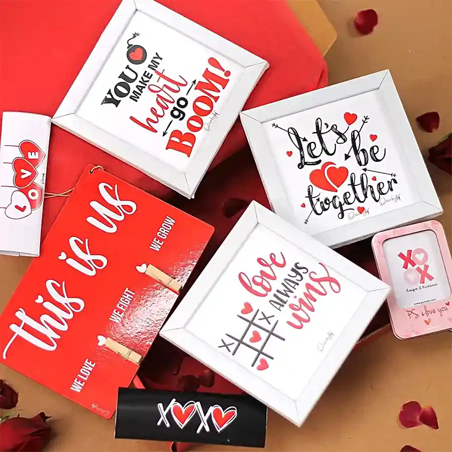 Love's Canvas Celebration Hamper with frames, chocolates, and cards for Valentine's Day.