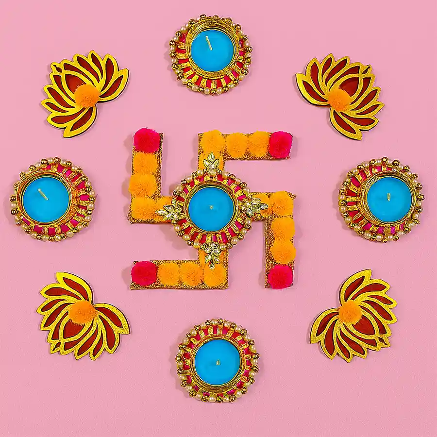 Festive Rangoli and Diya Set featuring reusable mats, Swastik design, and intricately crafted Lotus and designer diyas.