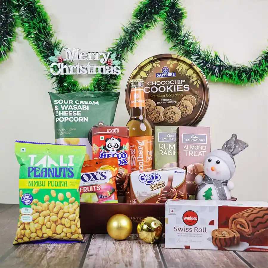 Festive Gourmet Delight Basket featuring a variety of snacks and sweets, perfect for holiday gifting, including peanuts, popcorn, and chocolates.
