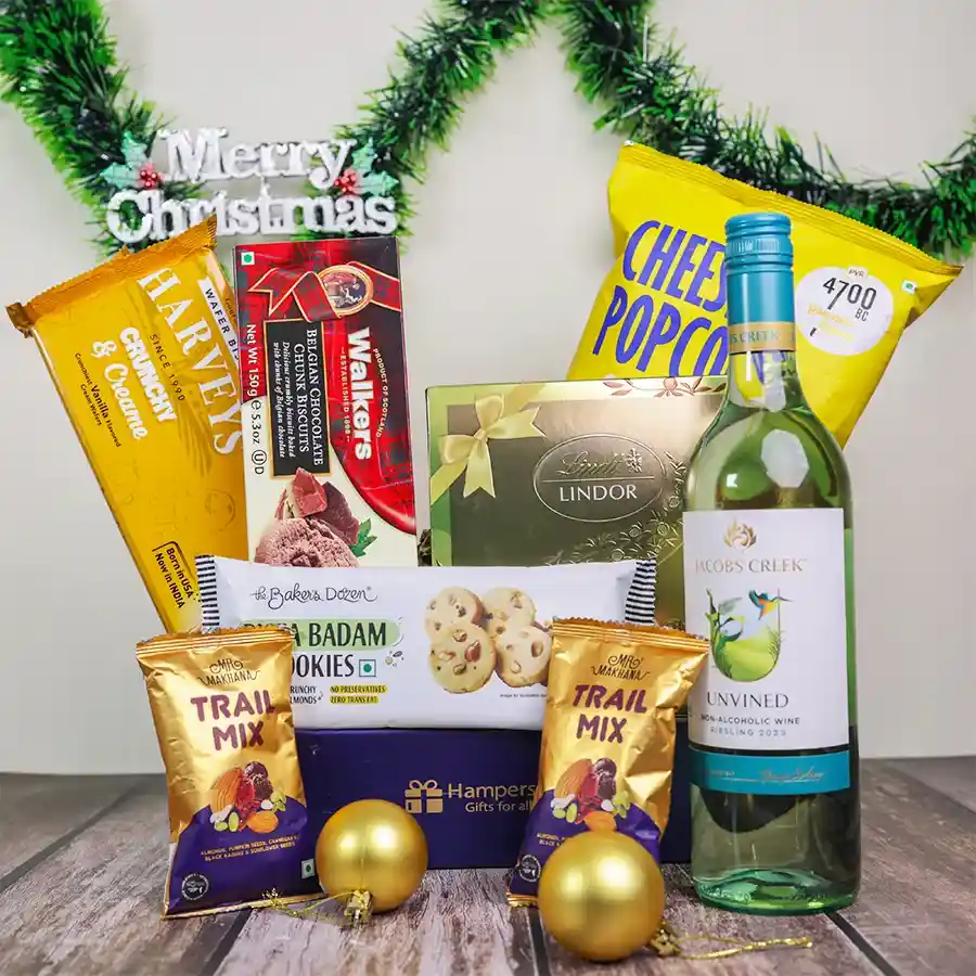 Holiday Snack and Sweet Treats Gift Set featuring trail mix, cookies, chocolates, biscuits, and cheese popcorn in a reusable basket.
