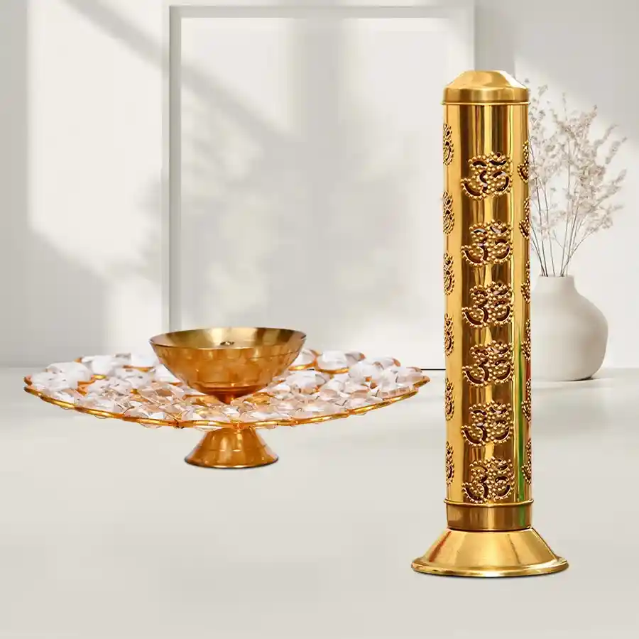 Radiant golden diya and agarbatti stand set with ash catcher, ideal for home and office decor.